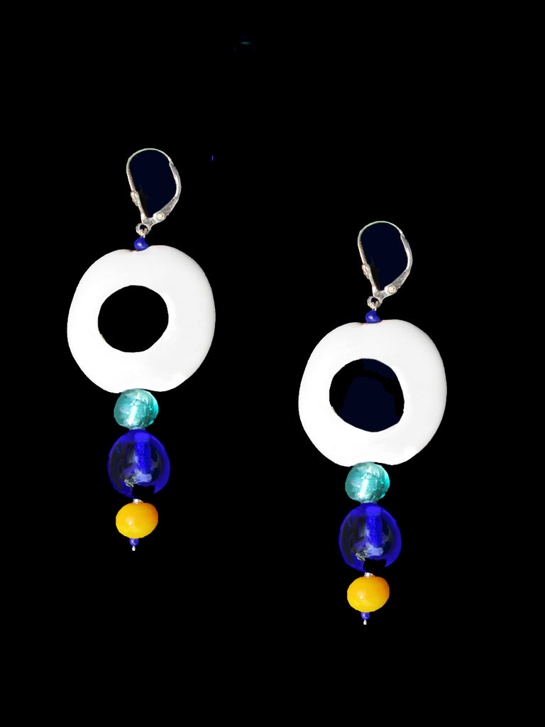 flat round white ceramic beads with black dot in center. Below is aqua modern Venetian, vintage French cobalt (1930s) and vintage yellow small round beads. sterling French ear wires with clasp. About 2"long in total
